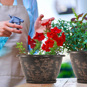 Flowyypo ultra-durable plastic pot resists cracking in sun and weather.