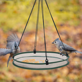 FoldTier foldable bird seed catcher with removable hooks for quick setup and storage.