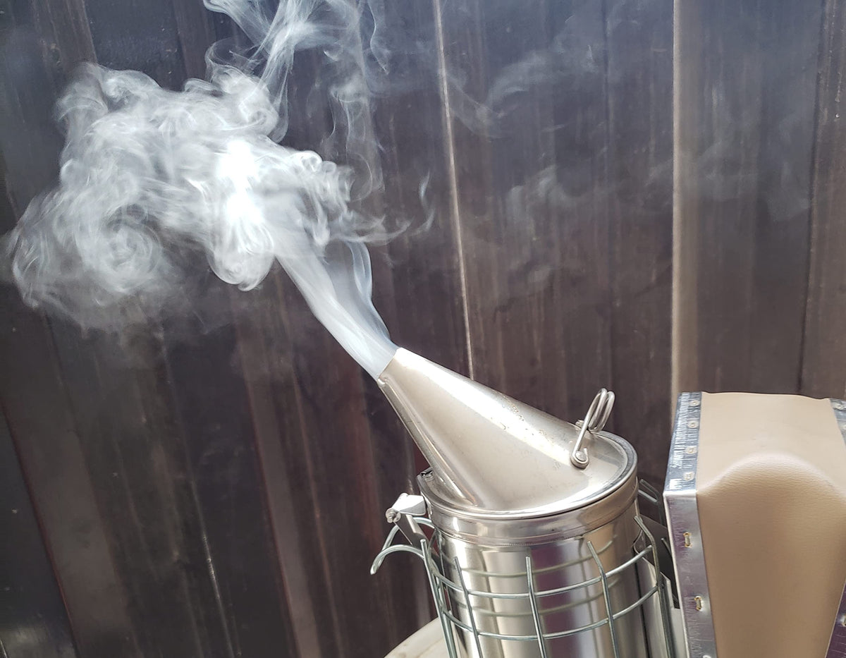FOREST BEEKEEPING SUPPLY long-burn smoker fuel provides steady smoke during hive inspections.