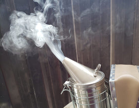 FOREST BEEKEEPING SUPPLY long-burn smoker fuel provides steady smoke during hive inspections.
