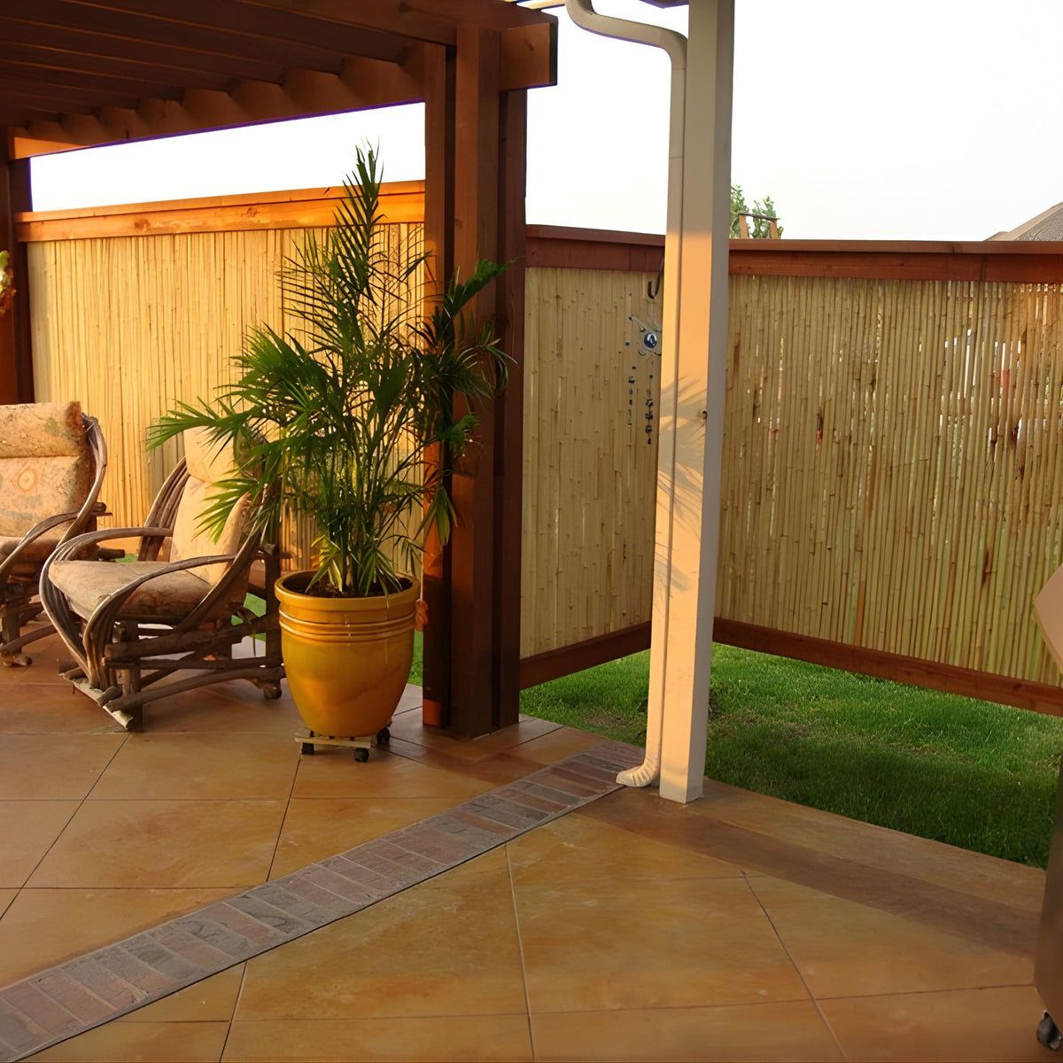 Forever Bamboo screening adds tropical feel to balcony privacy.