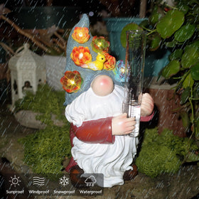 FORUP outdoor rain gauge shown in a yard setting, blending decor with rainfall tracking