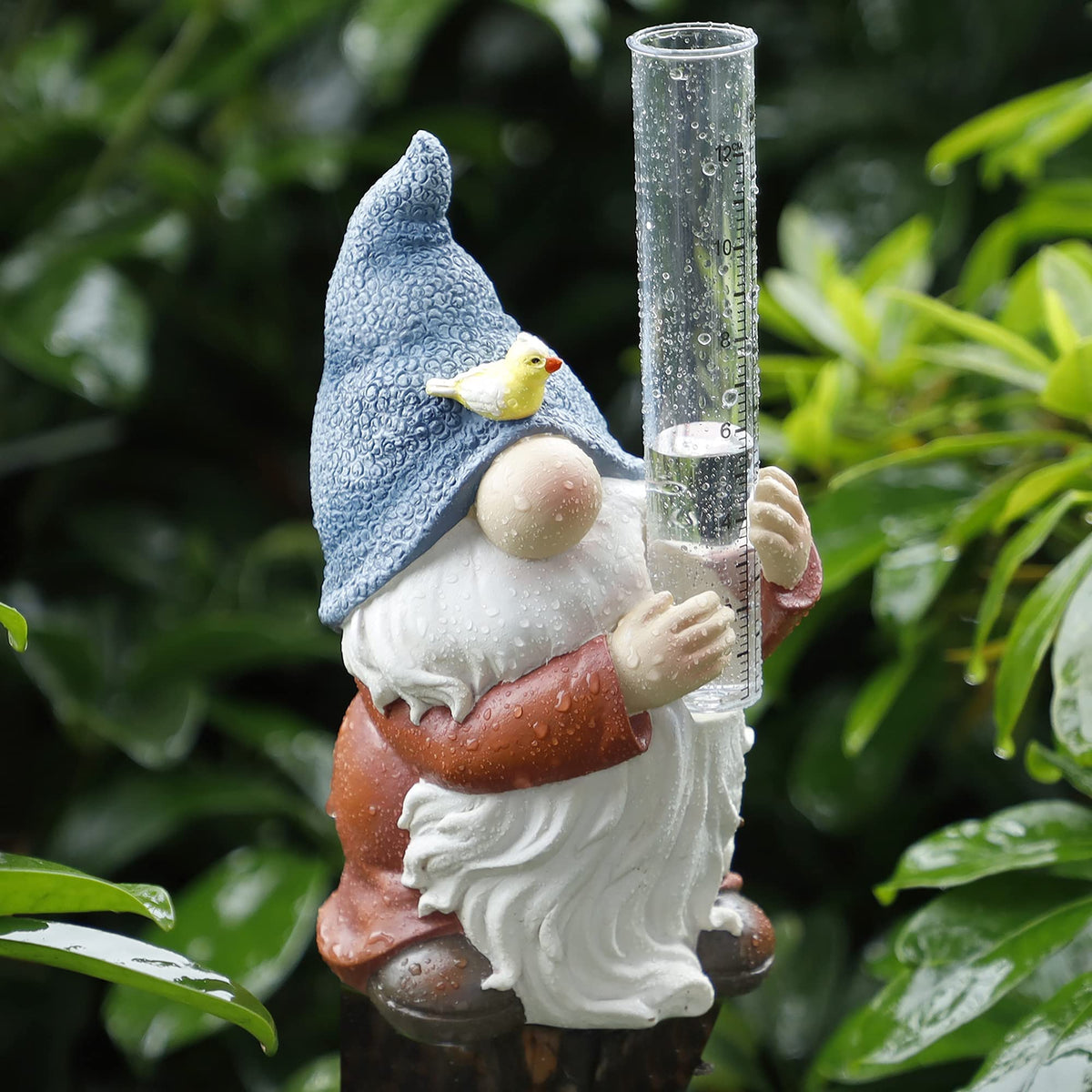 Forup resin gnome rain gauge with bird measures rainfall outdoors for garden planning.