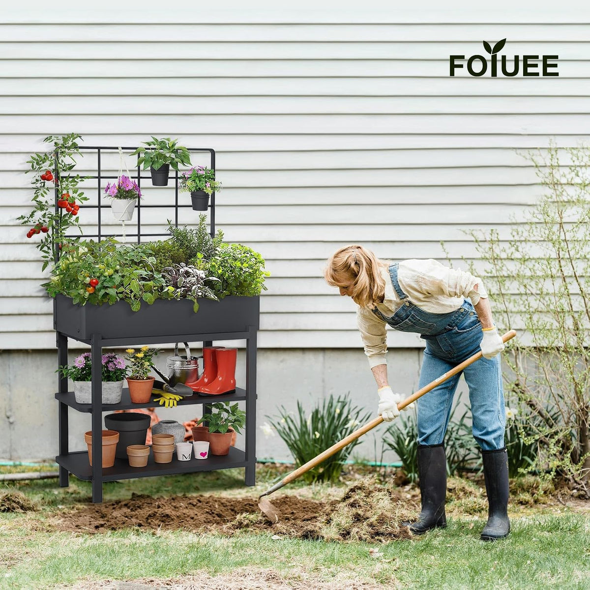 FOYUEE 2-tier storage shelf with soil bags and tools.