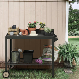 FOYUEE potting bench movable wheels for flexible placement.