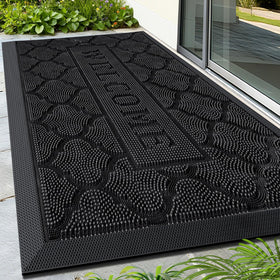 FRAMICS front door mat outdoors showing rugged surface that traps dirt effectively.