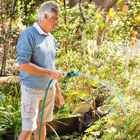 Freeasy garden watering scene demonstrates time-saving hose changes