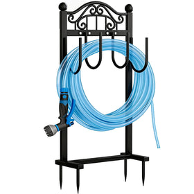 Freexployer garden hose holder with four-anchored base for stability on soft ground.