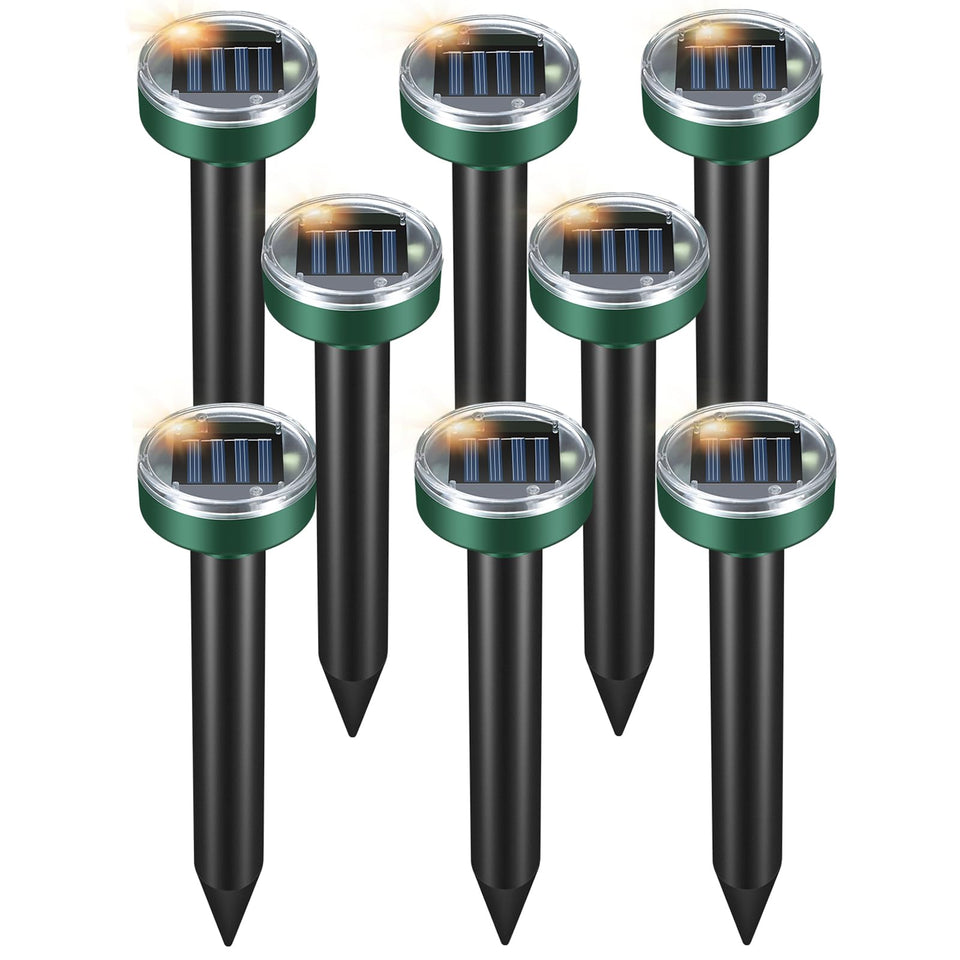 Fretech Mole Repellent solar stake in the yard protects lawns with quiet, eco-friendly deterrence.
