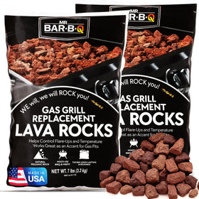 FryOilSaver lava rock in a gas fire pit for even heat distribution.