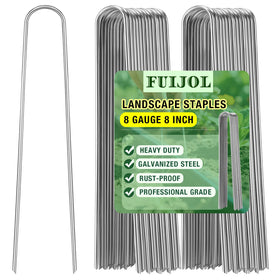 FUIJOL 8-inch landscape staples securing weed barrier fabric in heavy soil.