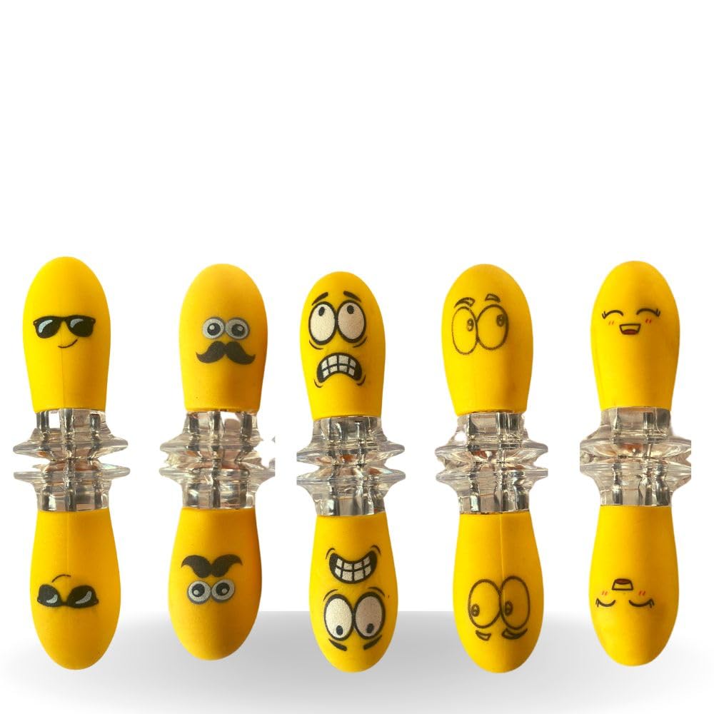 Fumiko corn holders with playful faces for easy, fun corn on the cob serving.