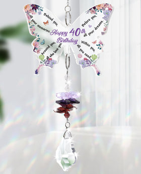 Funnli butterfly suncatcher front view with sunlight reflections.
