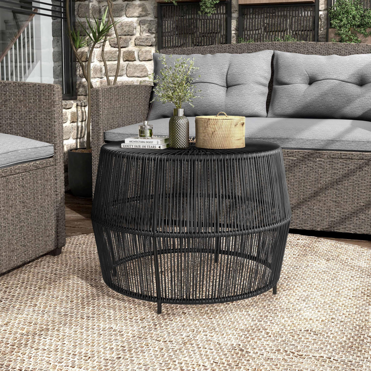 Furniture of America Ysar weatherproof wicker round table suitable for outdoor use.