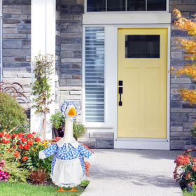 Lace details add charm to porch goose display.