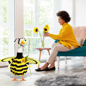 FuWeave sunflowers and bee wings goose outfit creates garden focal point.