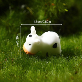 Fuyamp mini cow figurine for desk decor and charming table accents