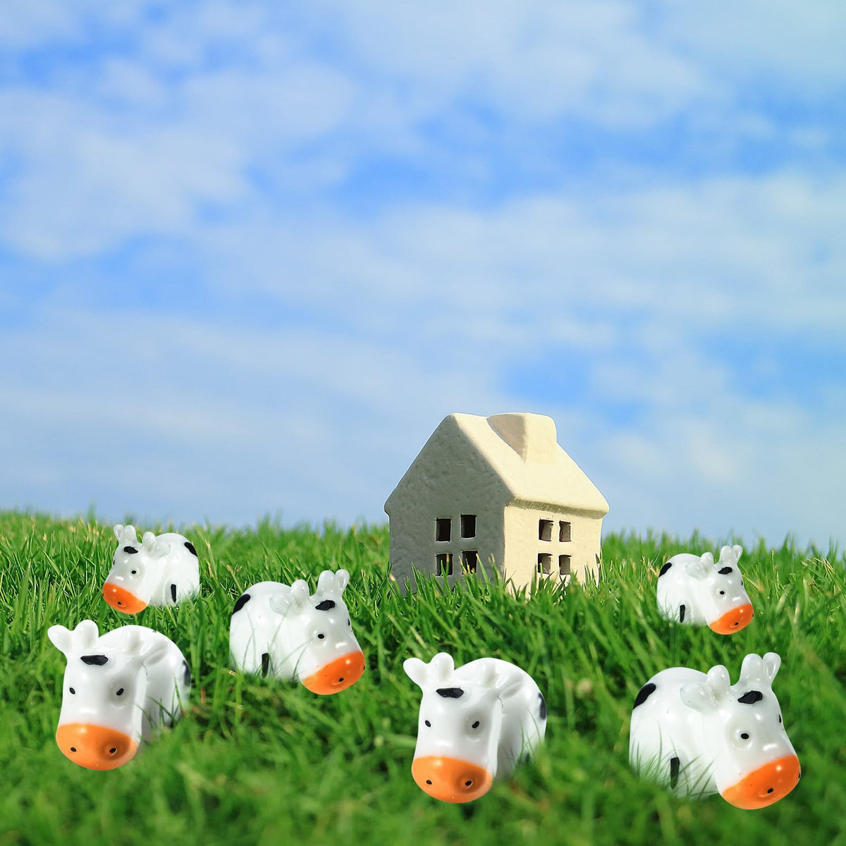 Fuyamp indoor garden cow figurine brings cute focal point