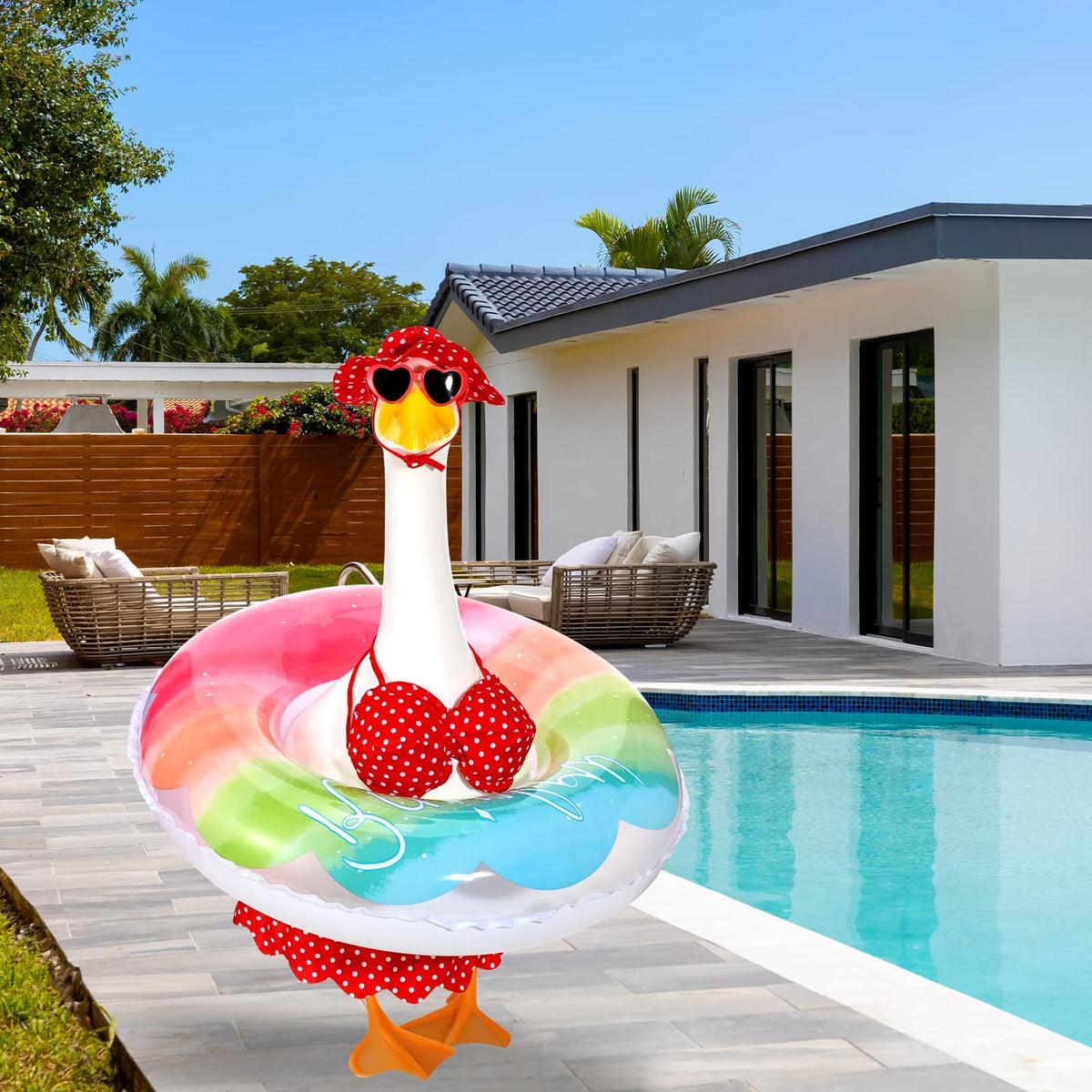 GANSHAYA swim ring secures around the goose statue for seaside-inspired fun