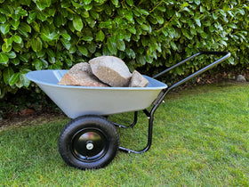 Garden Star wheelbarrow dumping action demonstrates easy unload.