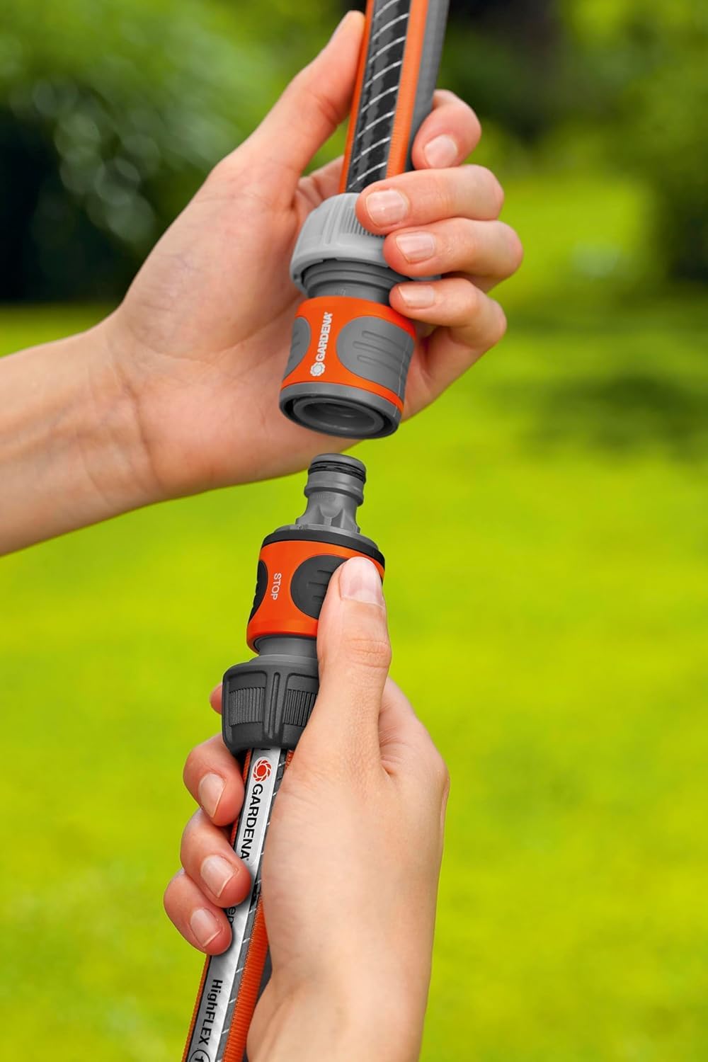 Gardena extension joint connecting two hoses for seamless extension