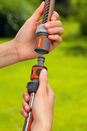 Gardena extension joint connecting two hoses for seamless extension