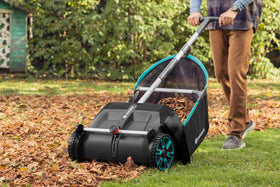 GARDENA adjustable-height sweep for use on grass, turf, and hard surfaces.