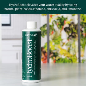 Gardyn HydroBoost system-ready setup; shows tubing and roots ready for treatment.