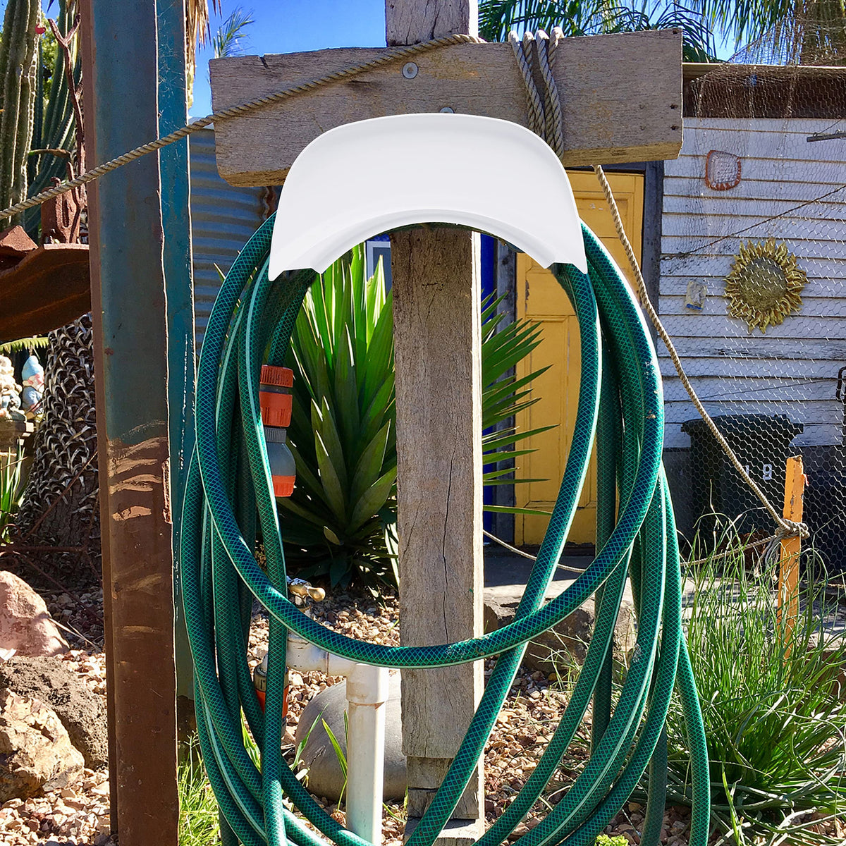 Gardzen outdoor hose hanger installed on exterior wall keeping hoses tidy