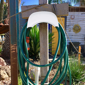 Gardzen outdoor hose hanger installed on exterior wall keeping hoses tidy