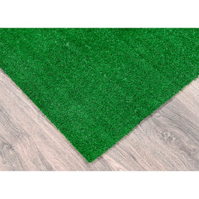 Garland Rug lush green closeup texture: durable polypropylene fibers.