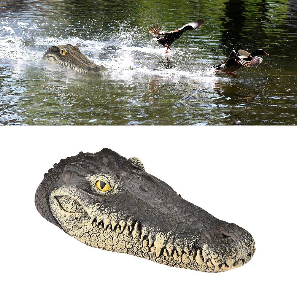 GARTENGERATE alligator head decoy floats, deterring birds in ponds.