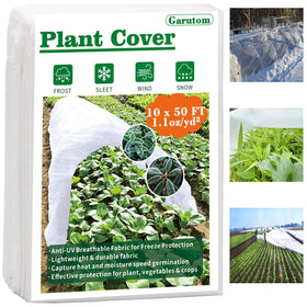Garutom frost cover 10ft x 50ft roll shielding vegetables from frost and cold wind.