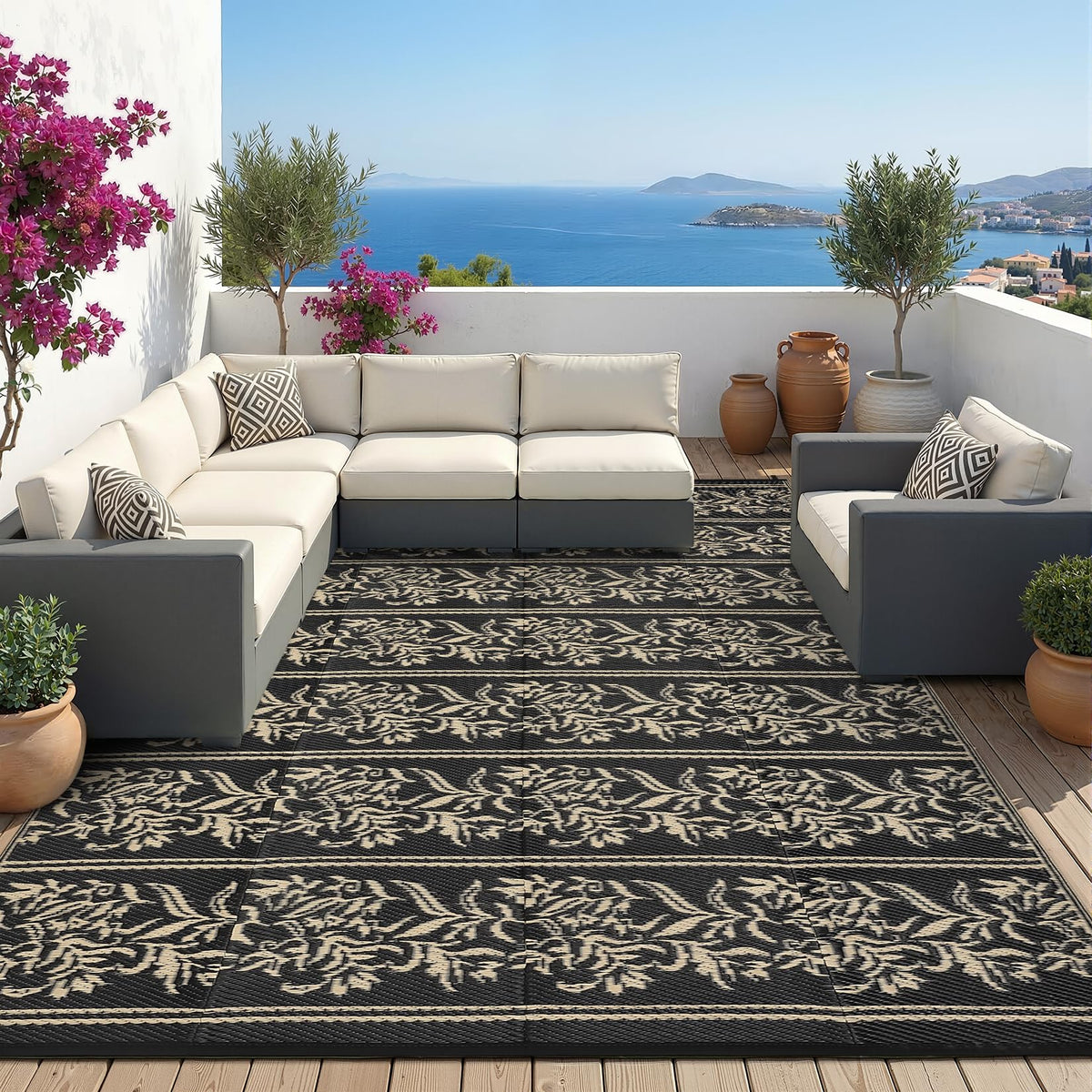 Black and brown colorway of Garvee outdoor rug complements spaces.
