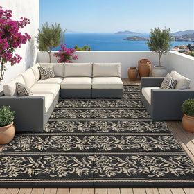 Black and brown colorway of Garvee outdoor rug complements spaces.