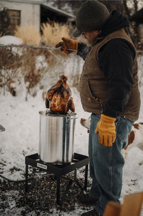 Outdoor setup with Gas One burner, ideal for tailgates and camping