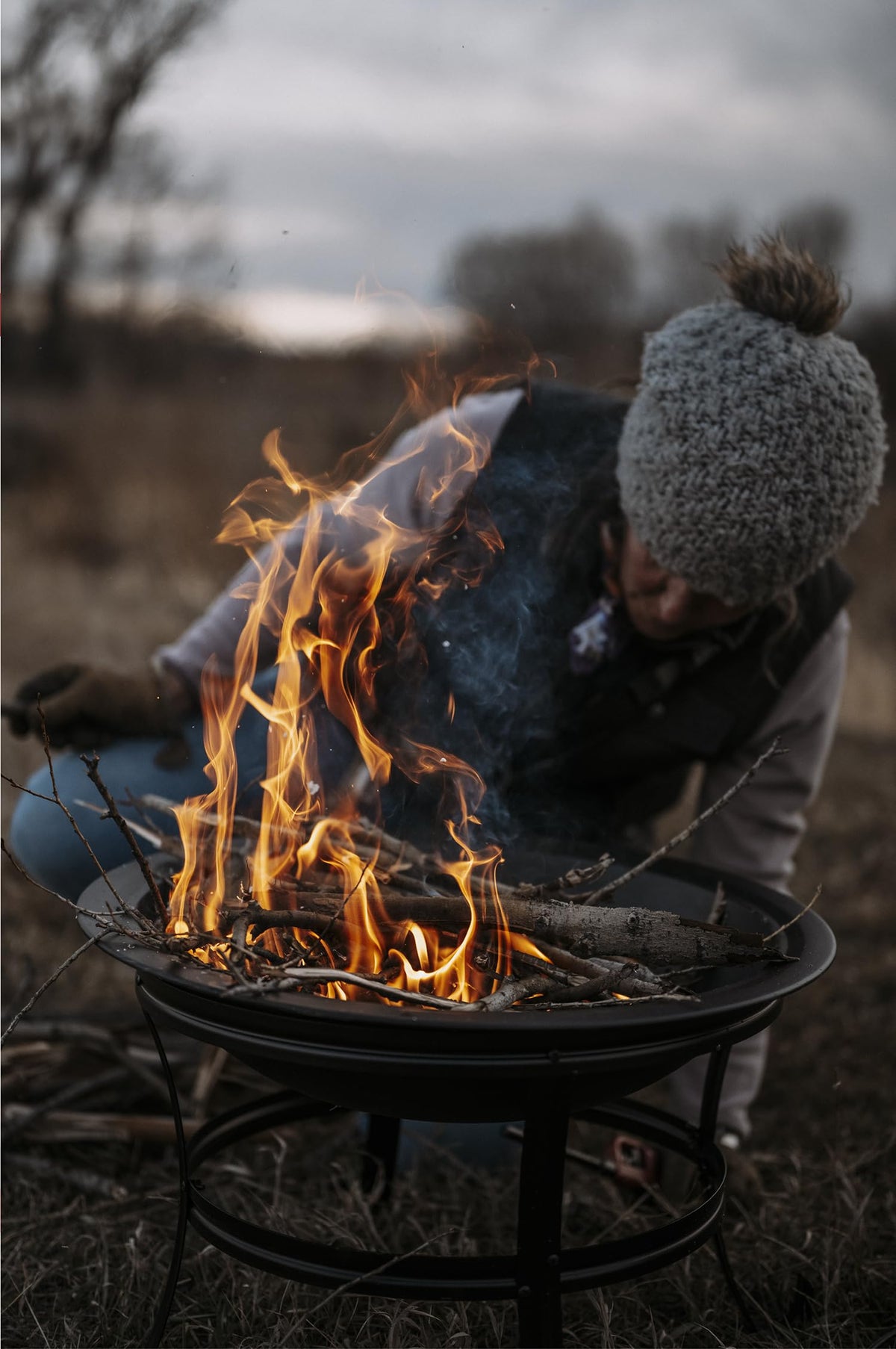Gas One outdoor fire pit on porch garden setting for cozy evenings.