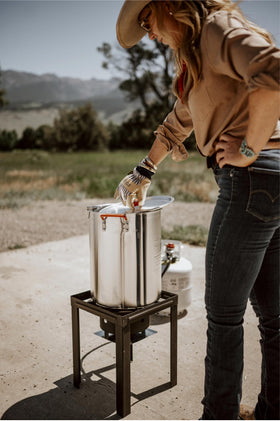 Gas One burner stand provides stable outdoor cooking platform