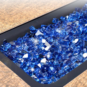 GasPro cobalt blue fire glass sparkles in daylight for a shimmering centerpiece.
