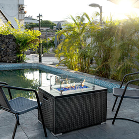 GASPRO glass beads arranged on a fire pit table create a dramatic flame backdrop.