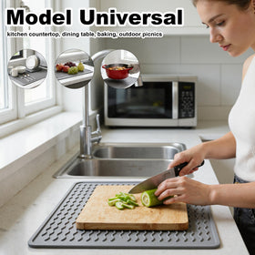 Geban flexible silicone mat folds for compact storage after grilling.