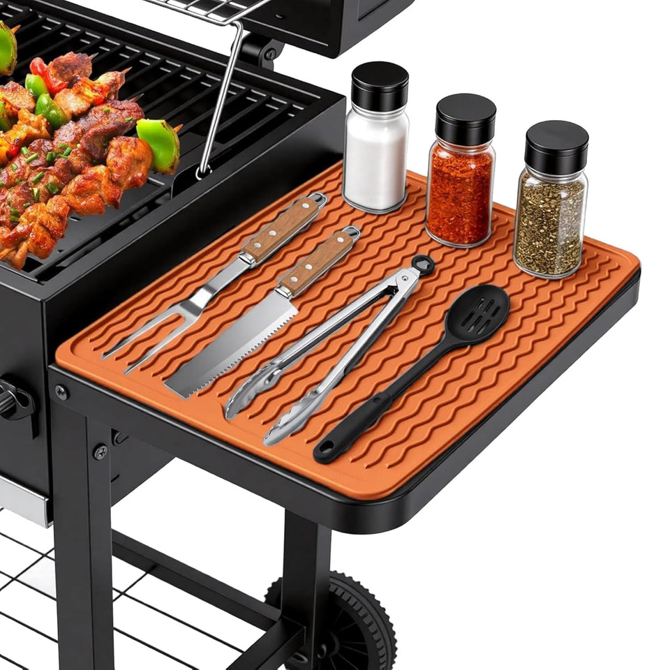 Geban silicone grill tools mat on side shelf keeps tools organized and protected.