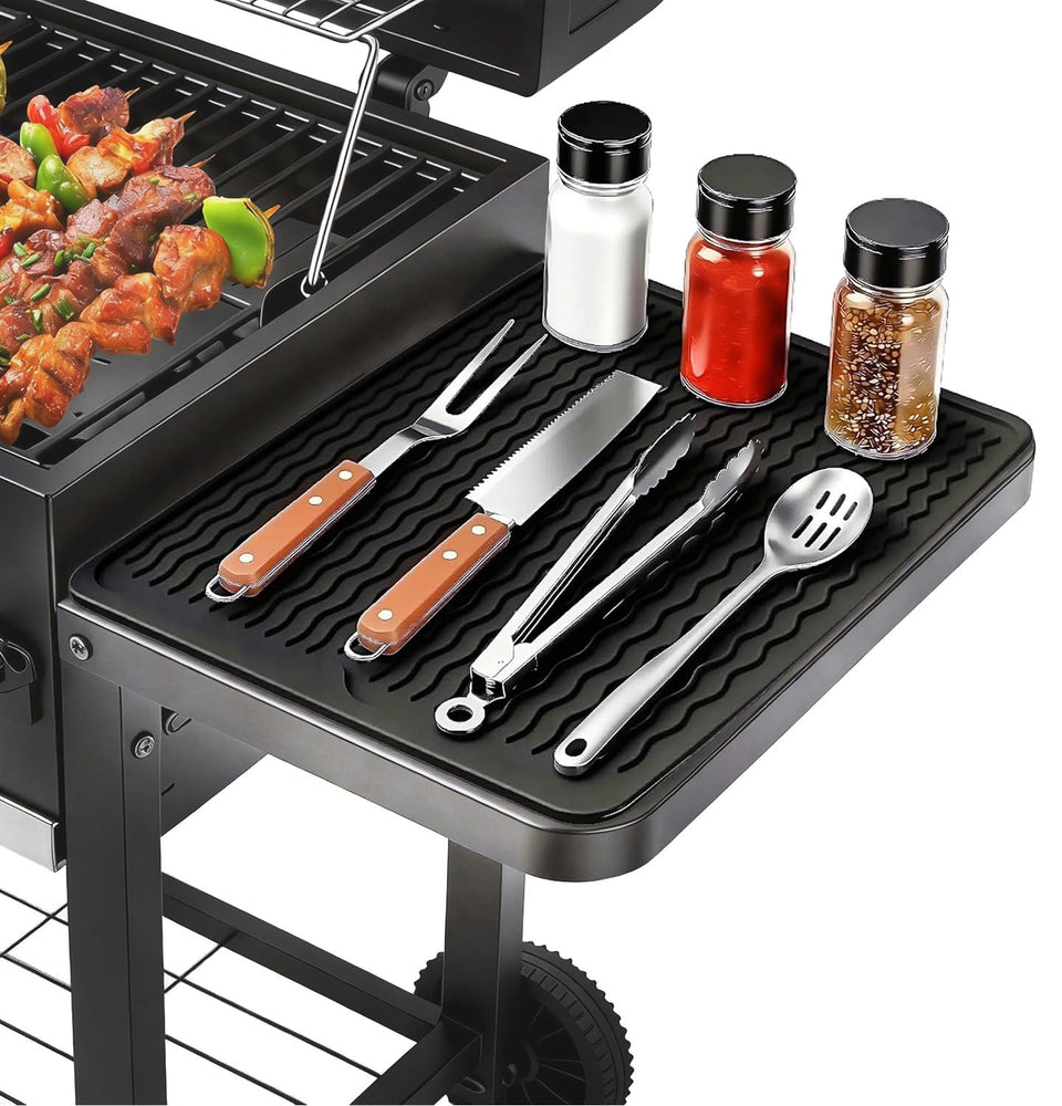 Geban silicone grill tools mat on counter protects surfaces and keeps tools organized.