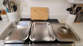 Geesta grill carry system simplifies transporting food to the grill.