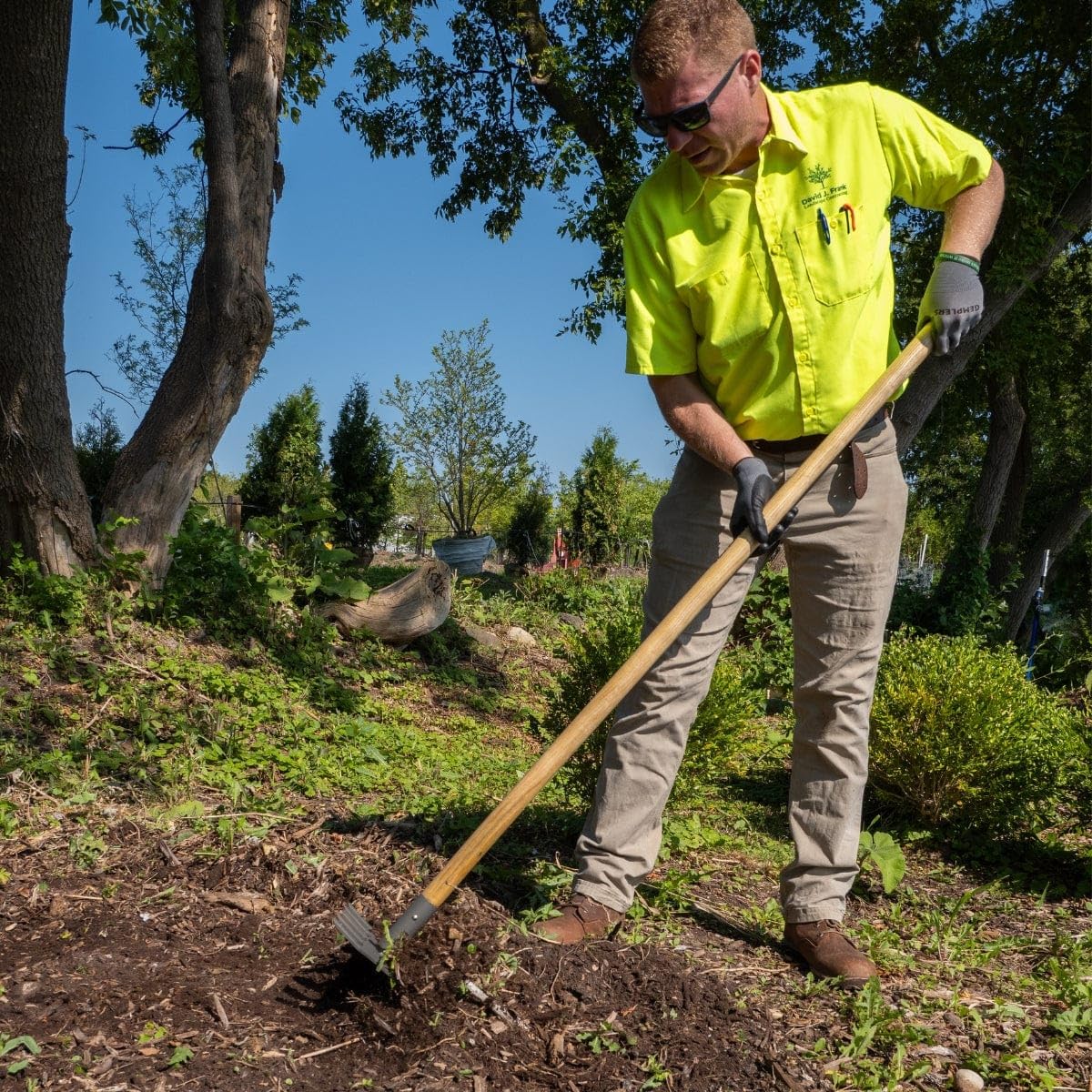 Gempler's rake with ergonomic wood handle for comfortable use.