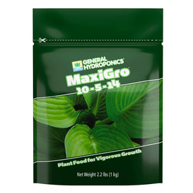 General Hydroponics MaxiGro bottle pour shows precise dosing for strong seedlings.