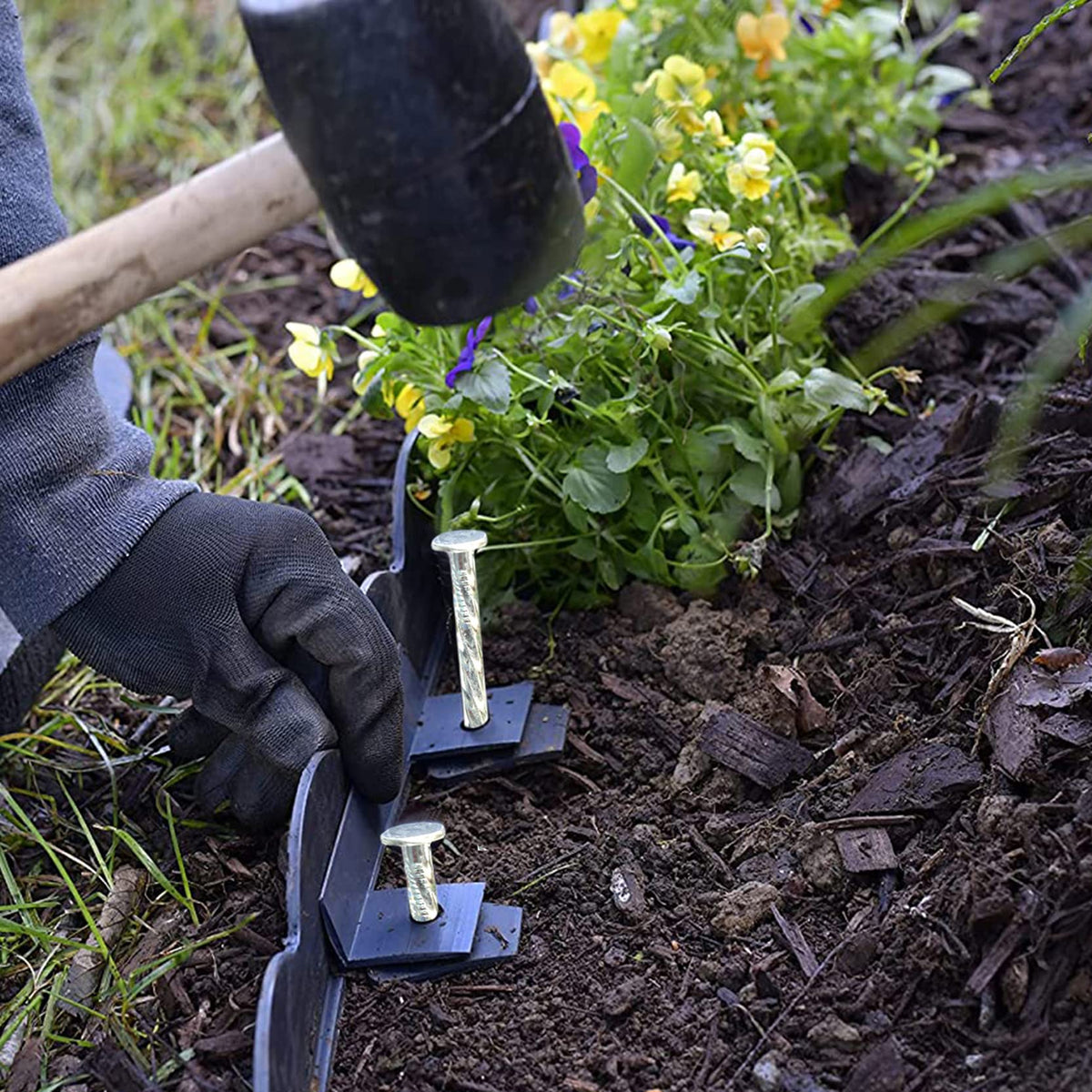 Generic stake demonstrated for edging, pavers, and barrier applications.