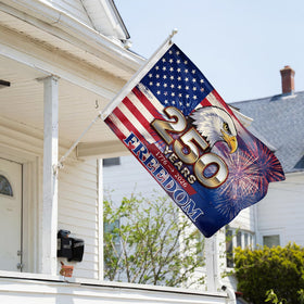 Generic flag close-up shows stitching and brass grommets for outdoor durability.