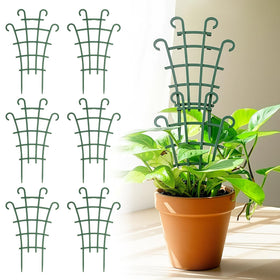 Generic six-piece indoor trellis stacked beside ivy for upright growth.