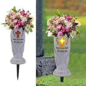 Generic cemetery vase with angel wings and cross solar light for grave visibility